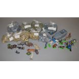 A mixed lot which includes; Britains knights, horses, a good quantity of plastic soldiers,
