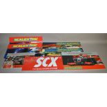 Seven original retailers vinyl display signs, mostly pictorial and single sided, advertising