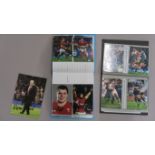 Sports signed photos in two folders signatures include Gareth Edwards, Graham Price, Robert