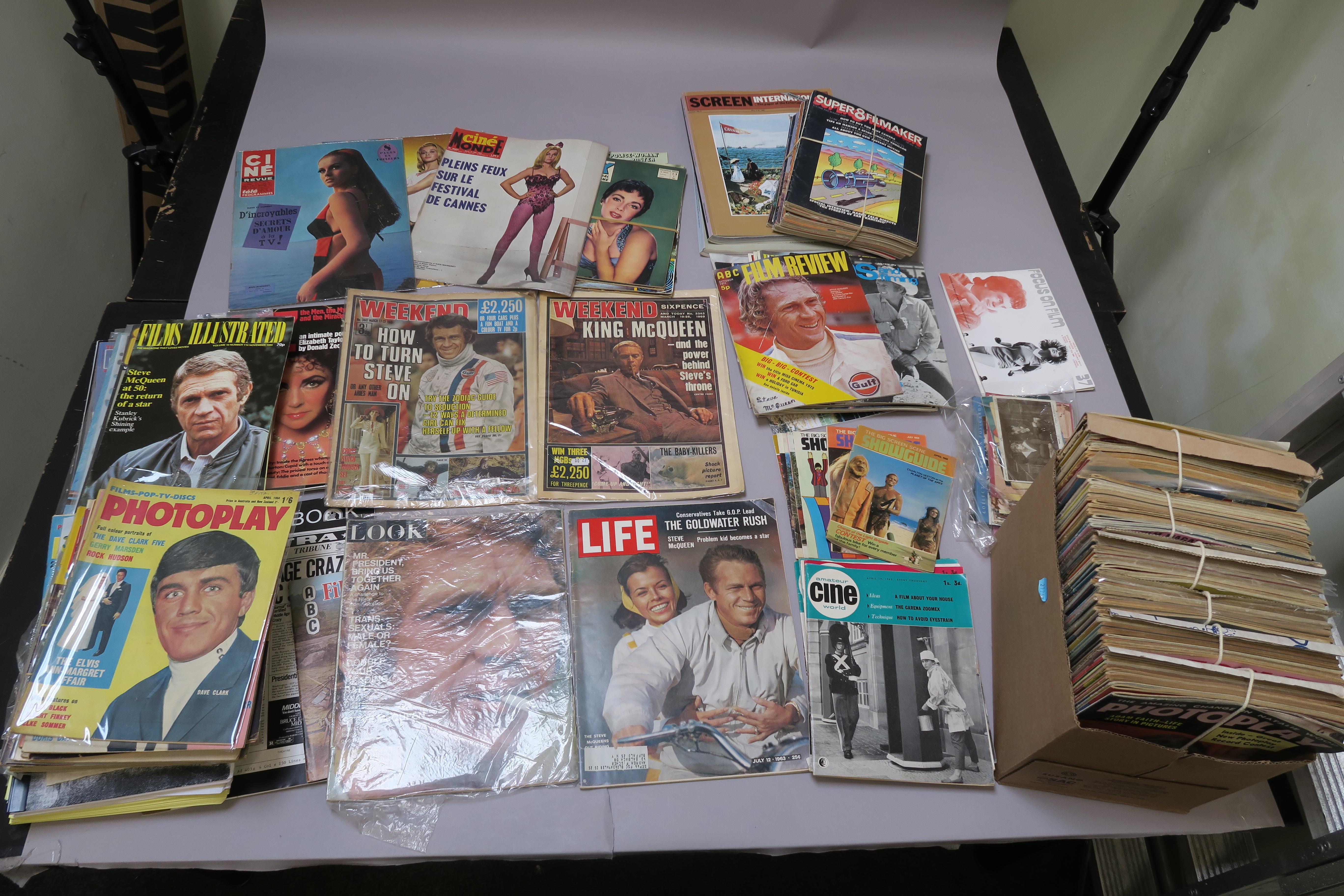 A collection of film magazines, inc. some feat. Steve McQueen, Roger Moore, a box of Photoplay