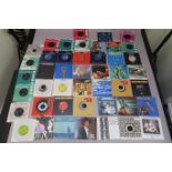 A collection of 7" singles mostly from the 1980's in excellent condition, some from the 1960's