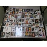 Collection of signed postcards with autographs from Phil Collins, Kate Moss, Victoria Beckham,