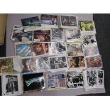 Box of cinema lobby cards and stills measuring 10"x8", most sets include 8 cards, titles inc.