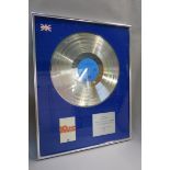 10cc 1977 long playing record album silver disc to recognise the sale in the United Kingdom of