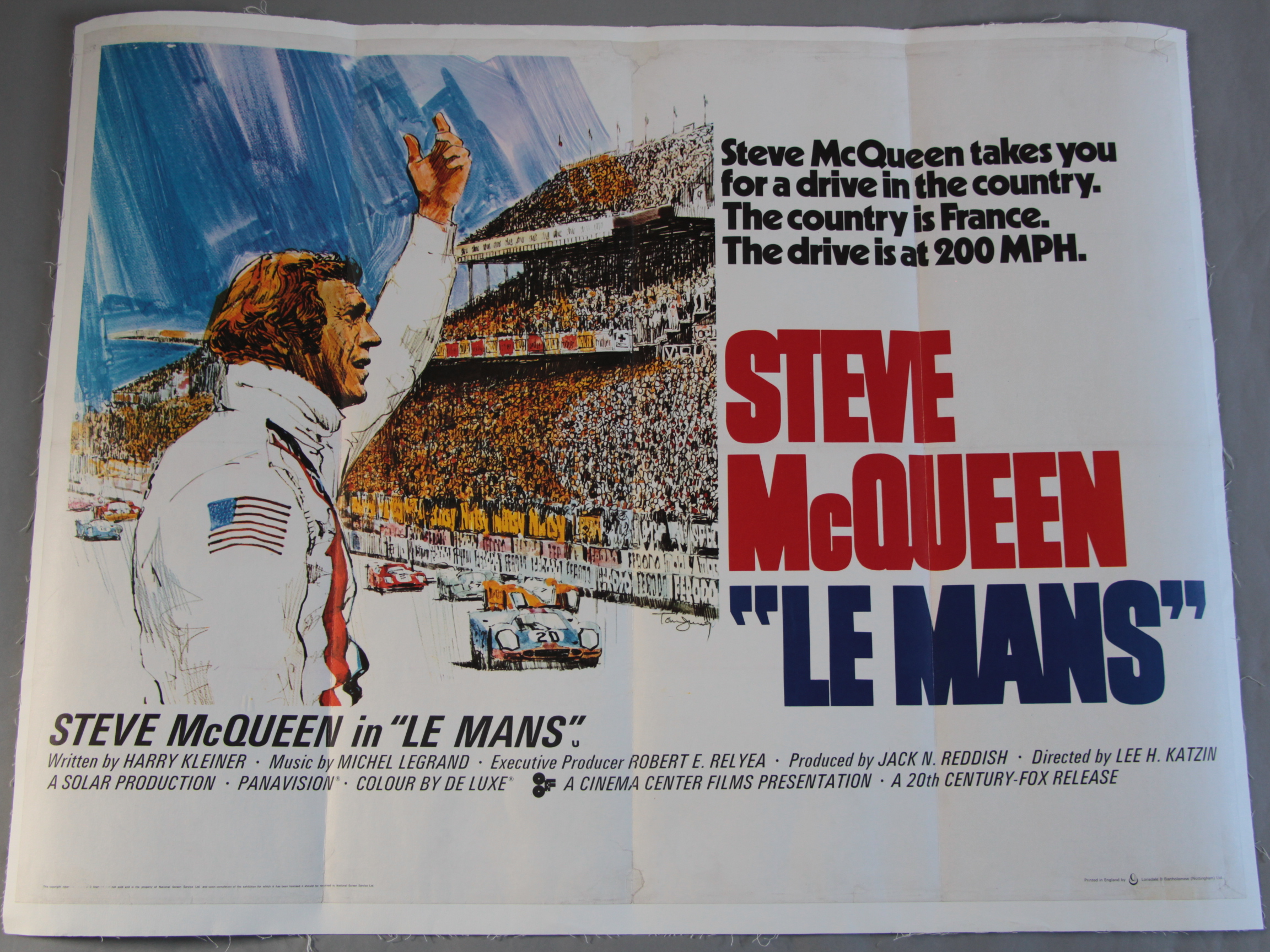 Steve McQueen in Le Mans original linen backed British Quad film poster from 1977 with art by Tom