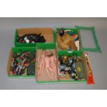 3 Action Man action figures and a large collection of clothes and accessories.