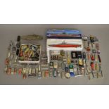 A collection of lighters, including James Bond, motorbike related and others