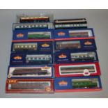 OO Gauge. 10 boxed Coaches including 8 by Bachmann, a GMR BR maroon Class B Suburban and a Dapol