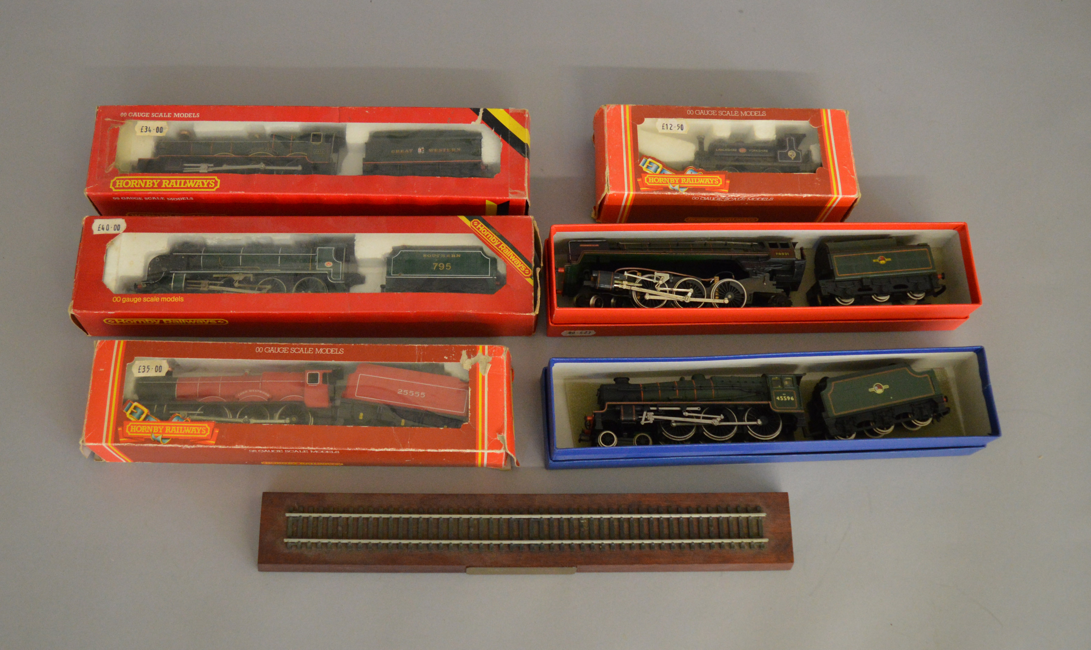 OO Gauge. 4 boxed Hornby Locomotives, R.150 L&Y 0-4-0 ST, R.369 BR Class 37 Diesel, R.761 GWR Hall