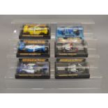 4 boxed Scalextric slot cars, C121 Elf Tyrrell, C129 March Ford, C133 Elf Tyrrell 008 and C134 Elf