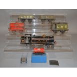 O Gauge.An unboxed Hornby 4-4-4 LMS Locomotive and four Wagons together with a boxed Hornby Dublo D1