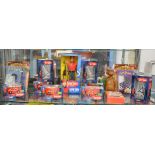 A collection of Captain Scarlet items, including; an action figure, diecast vehicles by Corgi etc,