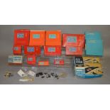 A quantity of mainly boxed Tri-ang Minic Motorway Accessories including Track Sections, Flyover,