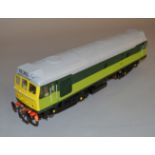 O Gauge. A 'Modellers Mecca' Class 25/3 Diesel Locomotive in two tone green with yellow ends,