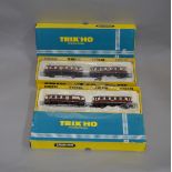 HO Gauge. 2 boxed Trix #2473 Railcar vt135 dr, bicolor locomotives, both appear VG boxed. (2)