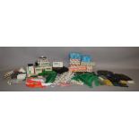 A good quantity of unboxed Scalextric Accessories including buildings, track sections, barriers etc.