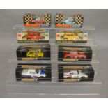 4 boxed vintage Scalextric slot cars, C. 77 Ford GT, C.78 A C Cobra Sports and two C.7 Mini Cooper