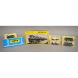 HO/OO Gauge. 7 boxed Trix railway items in HO and OO scales including a boxed 2 car DMU set in BR