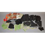 A small quantity of mostly Tri-ang Minic Motorway Accessories, mainly unboxed, including grassed