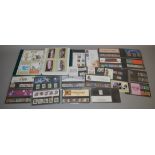 29 Royal Mail Presentation Packs containing various unfranked GB stamp sets together with an album