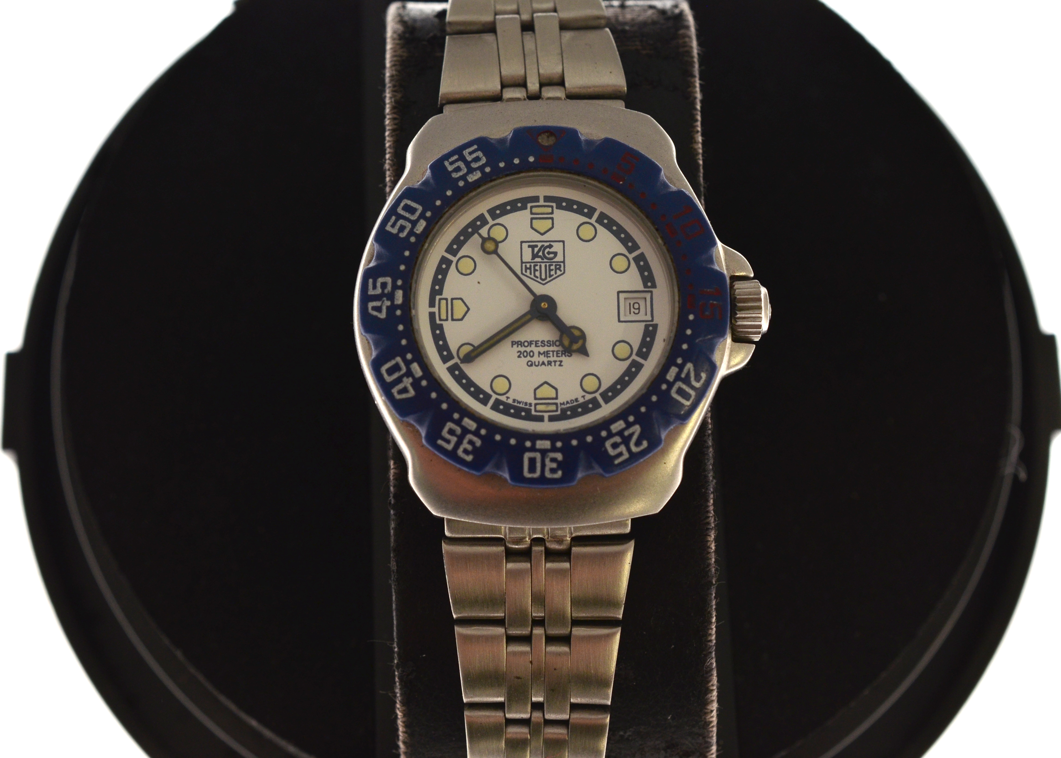 TAG HEUER - A ladies F1 Tag Heuer stainless steel quartz wristwatch, model WA1419, circa early 90's,