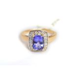 A tanzanite & diamond ring, tanzanite measures approx 7.8mm x 6mm, the diamonds total approx 0.