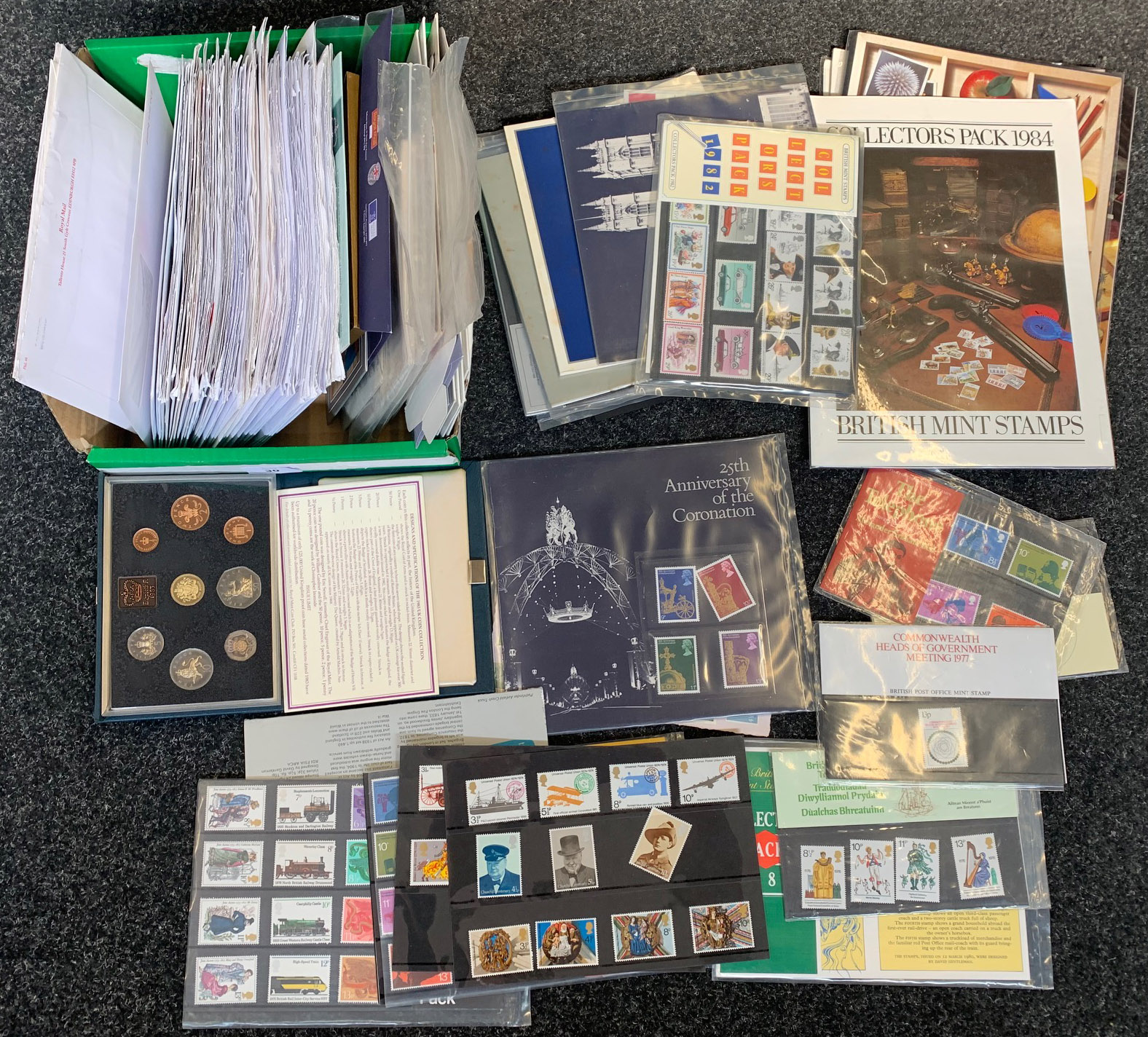 A boxed quantity of approx sixty first day covers, approx ten coin covers (some silver) &
