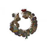 A silver charm bracelet with approx seventy enamelled tourist charms, some stamped 800, approx gross