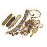 A bagged quantity of silver to include charm bracelet, bangle, knife etc, approx gross weight