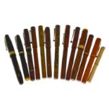 Thirteen pens to include red marbled, Conway Stewart, WAHL Eversharp rolled gold, all with 14k nibs