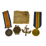 A WWI medal pair to 'W H Keyte' (Royal Warwickshire Regiment) with cap badge, forwarding