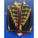 An early 20th century military dress uniform, with cloth badge on sleeve 'PGLR India 1911'