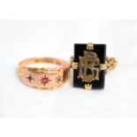 An Edwardian 9ct ruby set ring, H/M Birmingham 1907, size S, together with a mourning ring, size
