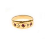 An early 20th century ruby & diamond ring circa 1910, tested to approx 18ct, size J, approx 1.9gms