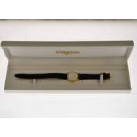 LONGINES - A ladies gold plated quartz wristwatch dated 1997, engraving to case back, with