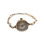 A 1920's ladies 9ct mechanical wristwatch, H/M London 1927, dial is clean, fault to hinge on case