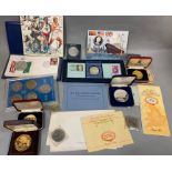 A small boxed quantity of commemorative silver coins/medallions to include, A Day of the Concorde