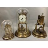 Three domed mantle clocks in various states of repair