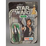 Palitoy Star Wars Han Solo 3¾ inch action figure on a 12 back card. Figure is E with clear bubble,