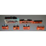 HO Gauge. A boxed Marklin 3005 Locomotive together with 6 boxed items of Rolling Stock, 4516,