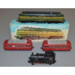 HO Gauge. A boxed Marklin 3066 Diesel  Locomotive together with two unboxed Railcars and an 0-6-0