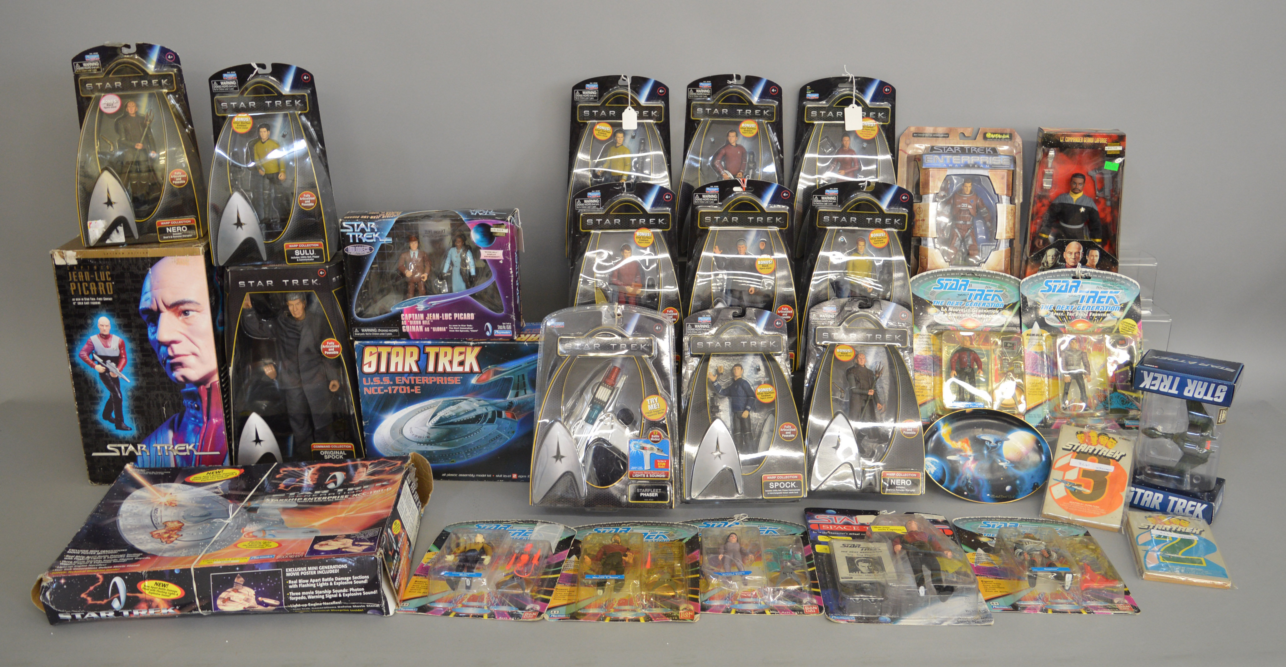 A large quantity of Star Trek items,mainly figures in original packaging. This lot is contained over