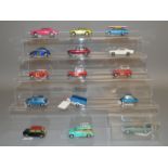 13 unboxed Corgi diecast model cars with varying degrees of play wear including a number of Mini