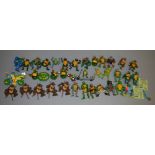 31 Teenage Mutant Ninja Turtles figures, this lot also includes a bike and some turtle window