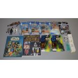 7 Star Wars carded figures along with 2 mail away figures, 2 guide books etc (16)