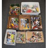 A very good quantity of loose Lego bricks and other pieces together with some built vehicles and a