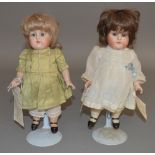 2 unboxed reproduction German procelain dolls, both  tagged 'Buttons & Bows by Sue Cooper' and named