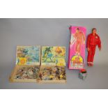 A boxed vintage Denys Fisher  'Six Million Dollar Man' 12 inch Action Figure dressed in red suit and