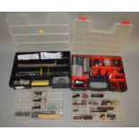 N Gauge. 4 plastic boxes containing a good selection of 'N Gauge' spares including track, lamps,