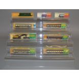 N Gauge. 5 boxed MInitrix Coaches and three items of Rolling Sock together with a Minitrix Diesel